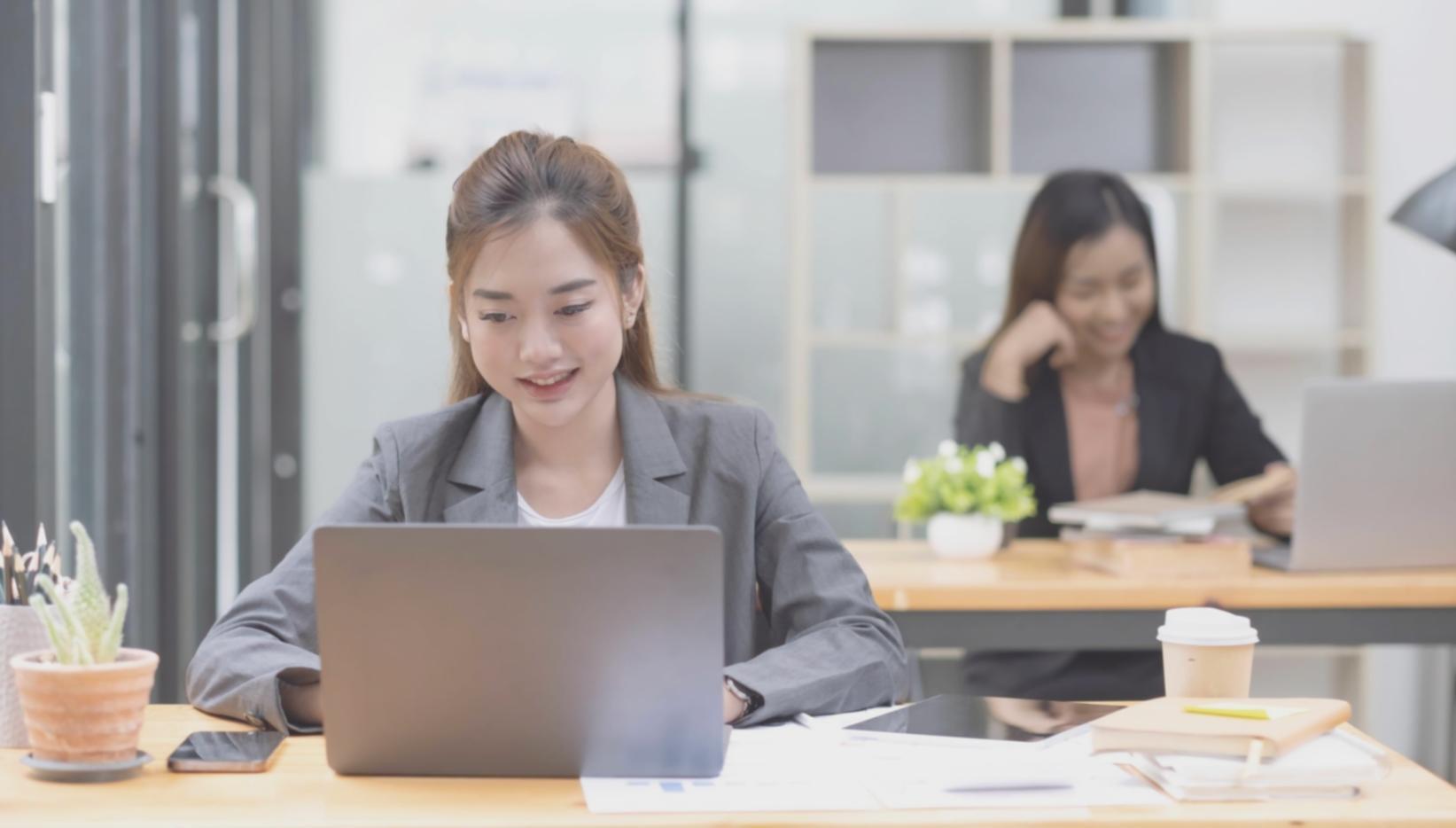 Financial planning workspace with documents and coffee
